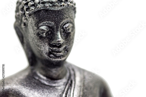 Face of little buddha figurine
