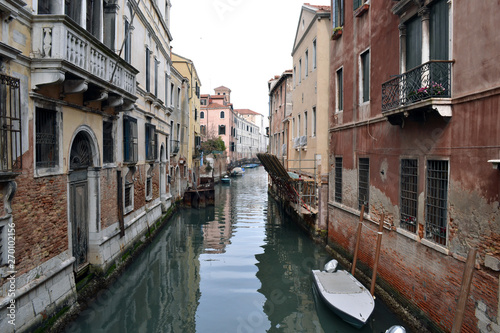 View of a typical Venetian canal with old buildings. © Svetlana