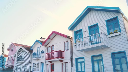 fisherman traditional houses on the touristic city of Aveiro in Portugal. Summer holidays and great location to travel. Panoramic view of a famous city in Portugal. colorful houses on the beach line.