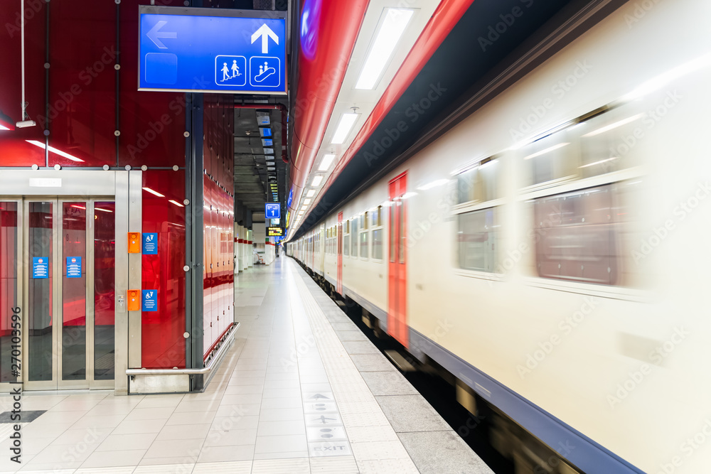 Obraz premium Empty subway station with speeding train, Brussels Belgium