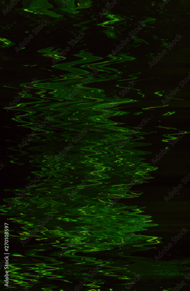 Abstract dark green paint background. Smooth glossy liquid fluid surface. Water expanse. Ripples effect pattern texture.