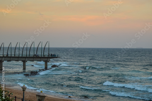 Beautiful Umhlanga Promenade Pier a whalebone made pier in Kwazulu Natal Durban North South Africa during sunset