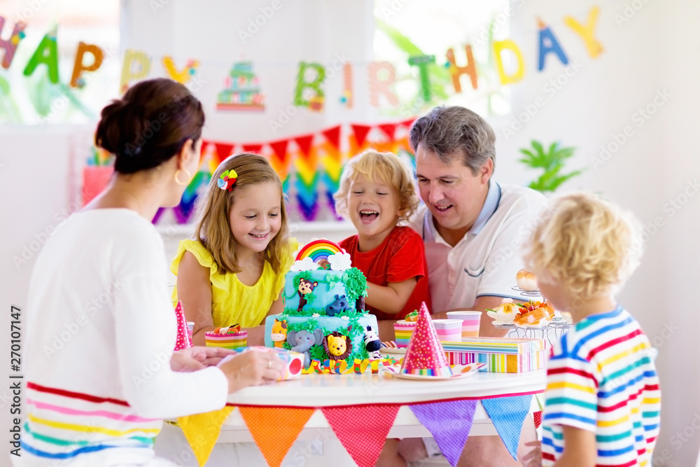 Child birthday party cake. Family with kids. Child birthday party cake. Family with kids.