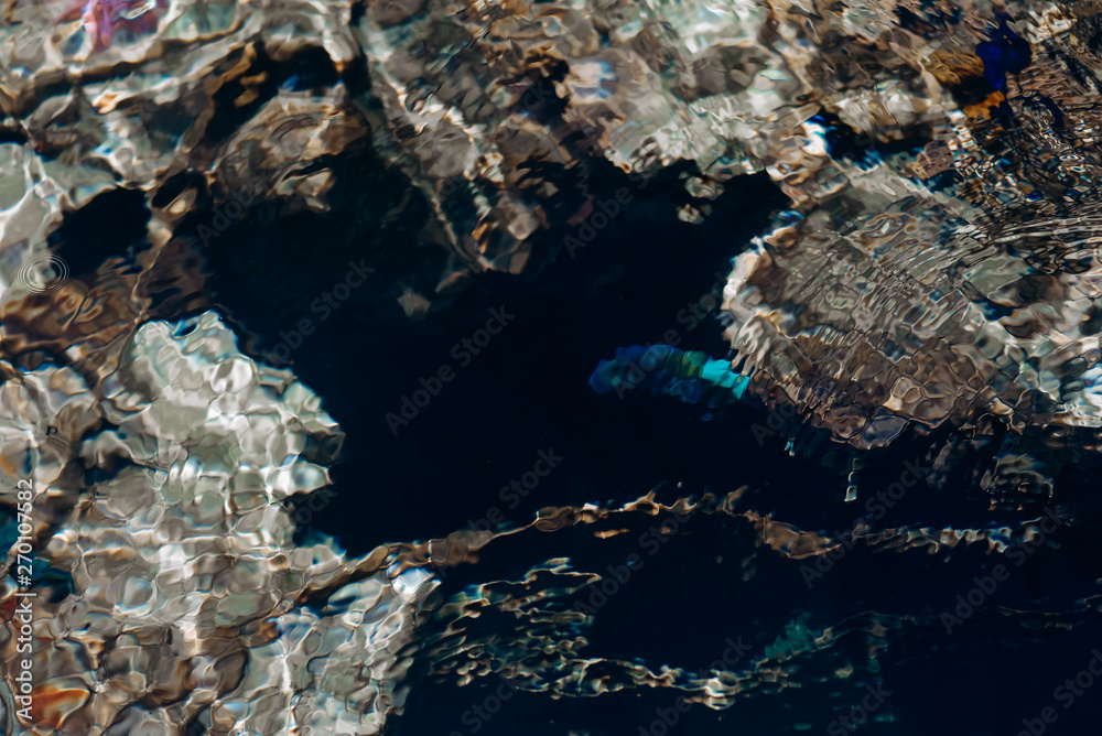 A tropical limestone coral reef from above water.