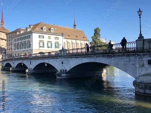 Münsterbrücke (Muensterbruecke or Munsterbrucke) - A pedestrian and road bridge over the Limmat in the city of Zürich, Switzerland photo