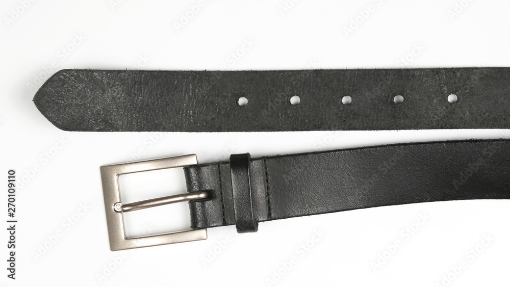 black leather belt on white background. items of clothing and equipment. black leather belt on white background. items of clothing and equipment.