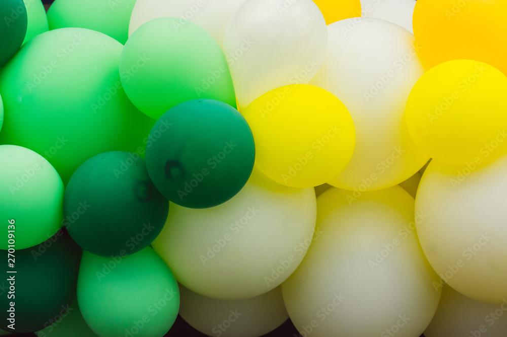 A lot of multicolored balloons, green and white, pride festival A lot of multicolored balloons, green and white, pride festival