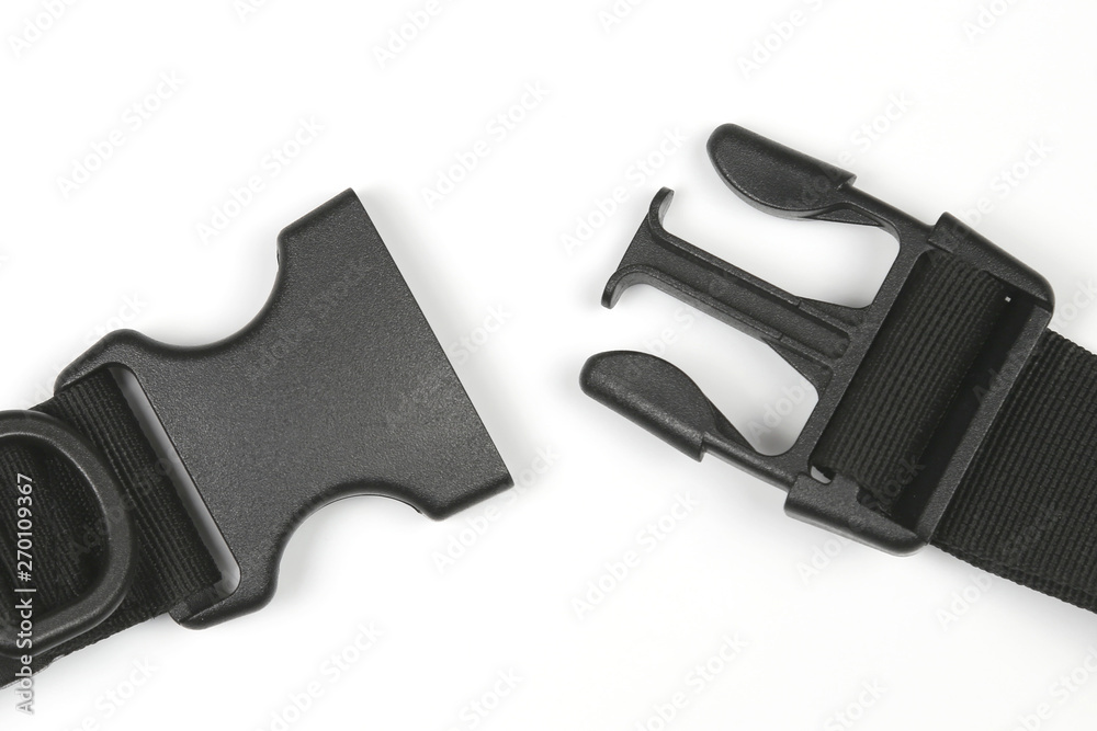 black plastic Fastex clip for backpacks on a white background black plastic Fastex clip for backpacks on a white background