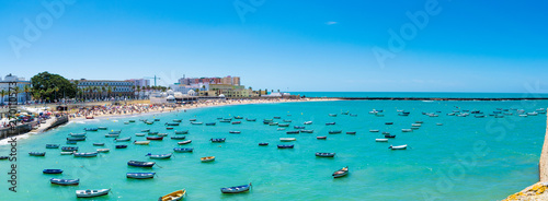 Boats docked in the Spanish bay of Cadiz photo