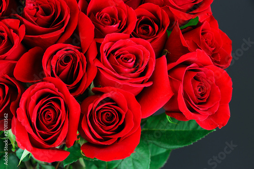 Fresh red roses bouquet flower background