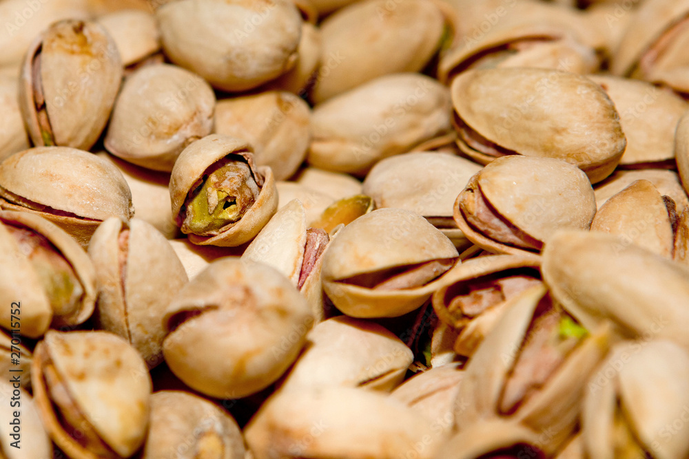 Pistachio texture. Nuts. Green fresh pistachios as texture