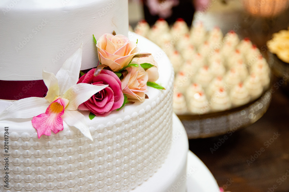 Scenic cake on a table decorated for a wedding party. Scenic cake on a table decorated for a wedding party.