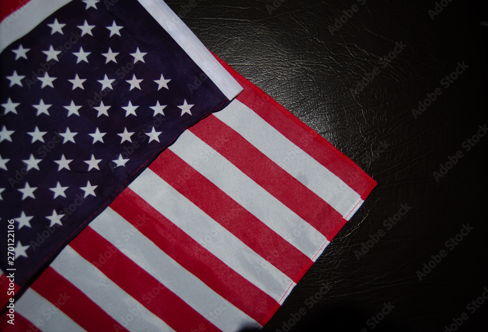 Fototapeta premium Usa flag on black leather