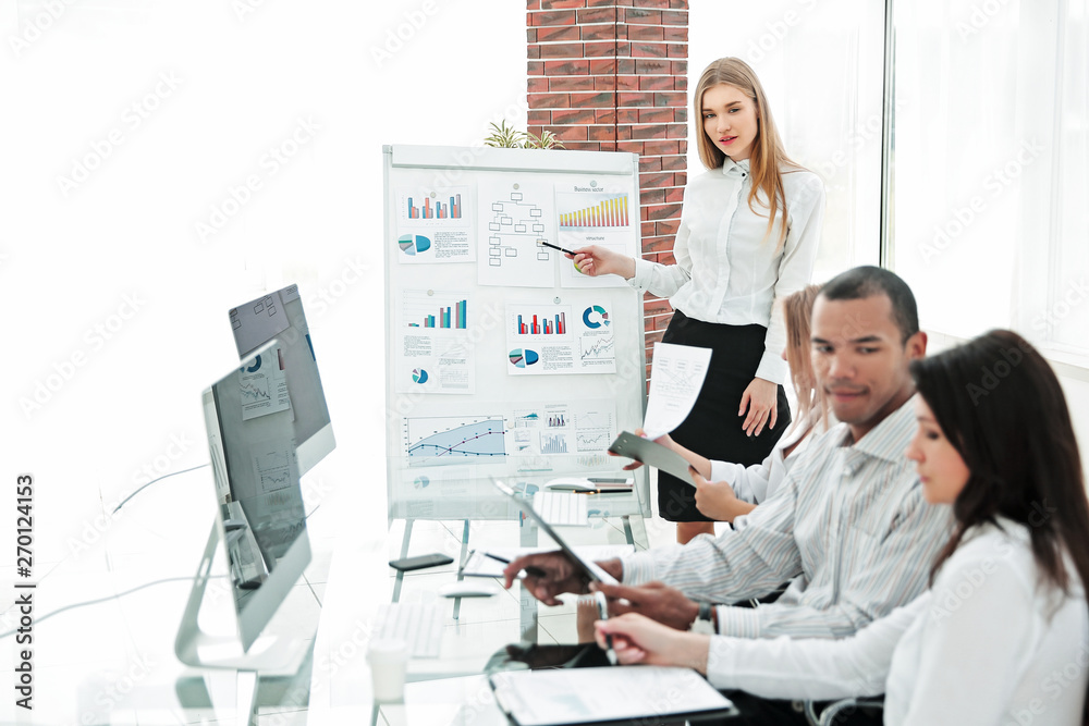 business woman making presentation to business partners