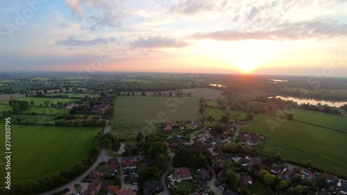 Aerial Drone Footage of a sunset over the Norfolk village of South Walsham. photo