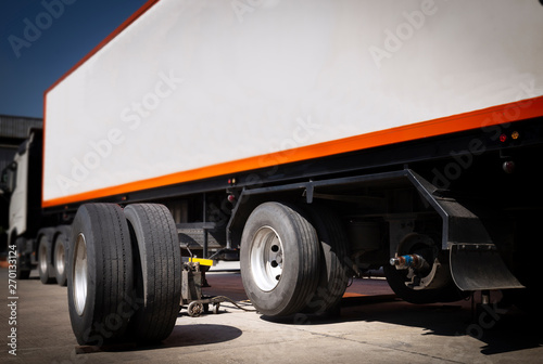truck repairing and maintenance. truck spare wheels tire waiting to change.