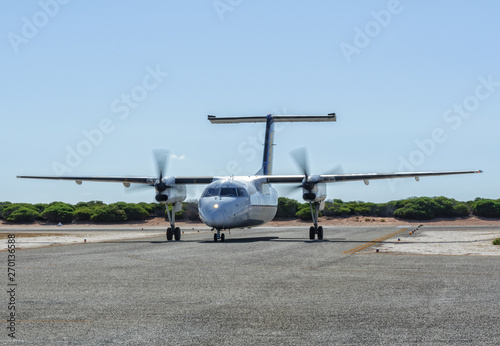 A twin-engine short-haul airplane on the taxiway - Monkey Mia, WA, Australia
