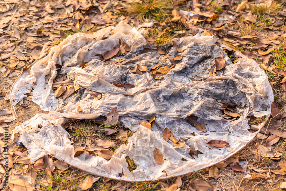 white paper lantern on ground as the problem of waste. white paper lantern on ground as the problem of waste.