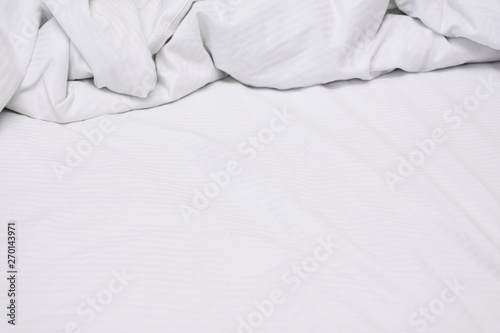 White delicate soft background of fabric or bedding sheet photo