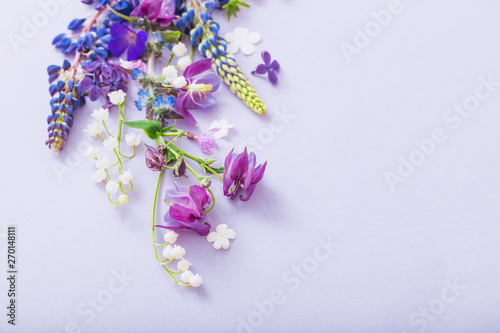 purple, blue, pink flowers on paper background