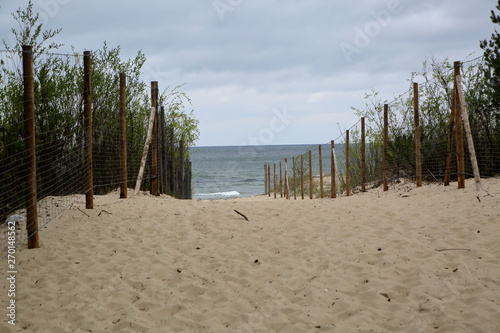 Fototapeta Naklejka Na Ścianę i Meble -  sandy path to Baltic sea beach in Poland, sea in background