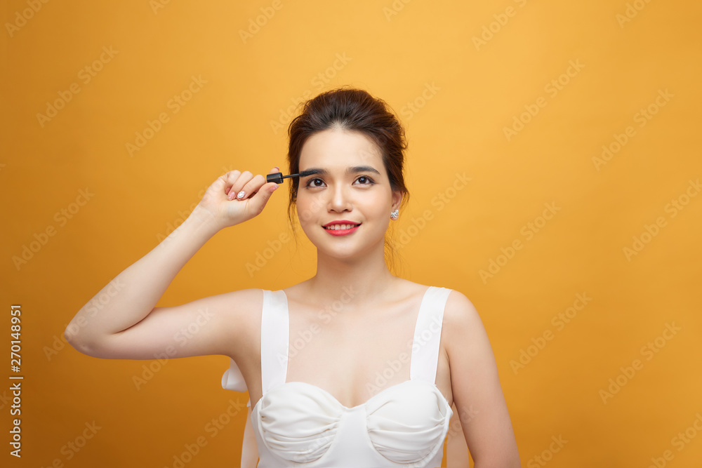 Woman mascara applying brush, female portrait makeup eyelashes. Woman mascara applying brush, female portrait makeup eyelashes.