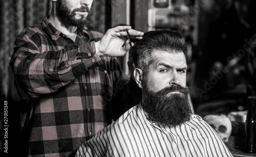 Beard man in barbershop. Hairstylist serving client at barber shop, bearded. Hairdresser, bearded man. Vintage barbershop, shaving. Man hairstylist. Black and white