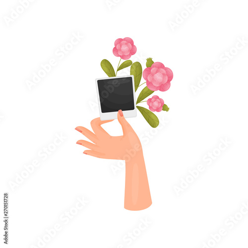 Hand with two fingers is holding a photo card poloroid. Vector illustration on white background.