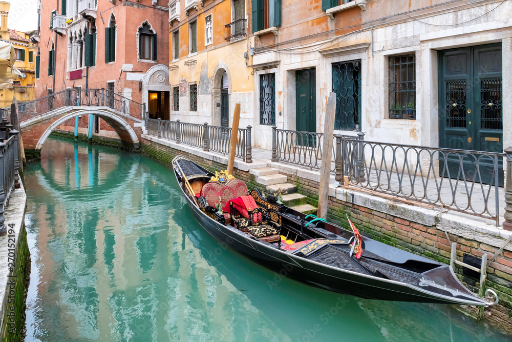 Venice traditional Gondolas on canal in Venice, Italy.