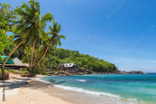 Exotic beach on Seychelles. Anse Takamaka beach on tropical island Mahe in Seychelles