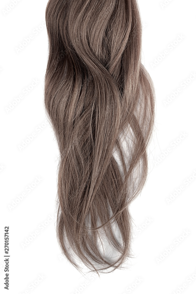 Naklejka premium Brown hair isolated on white background. Long wavy ponytail