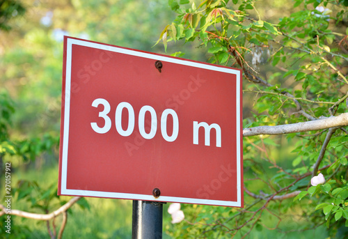 3000 meters direction sign in nature