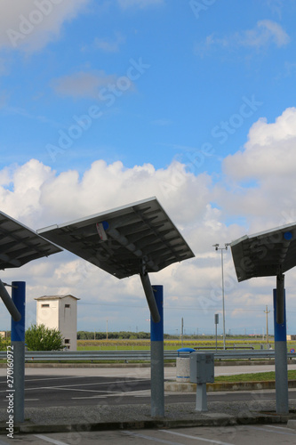 Solar panels used as roofs of parking lots at the motorway
