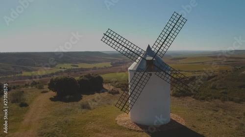 Aerial shot of a lonely windmill in Spain