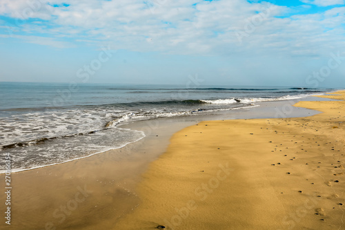 Summer background of ocean and beach with blue sky. Free space for your decoration. 