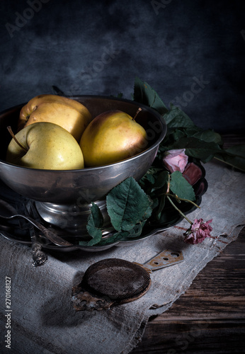 Tableau sur toile Still life with melchior bowl, apples and vintage cutlery