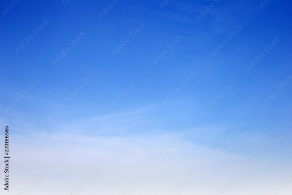 Obraz premium blue sky with white, soft clouds