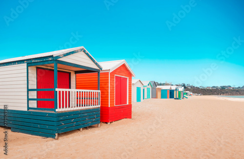 Beautiful Bathing houses at sandy beach at Brighton beach in Melbourne, Australia.