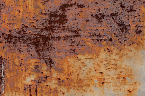 Abstract corroded colorful rusty metal background  rusty metal texture. Peeling paint and rusty old metal