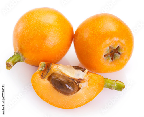 Loquat fruit on white background