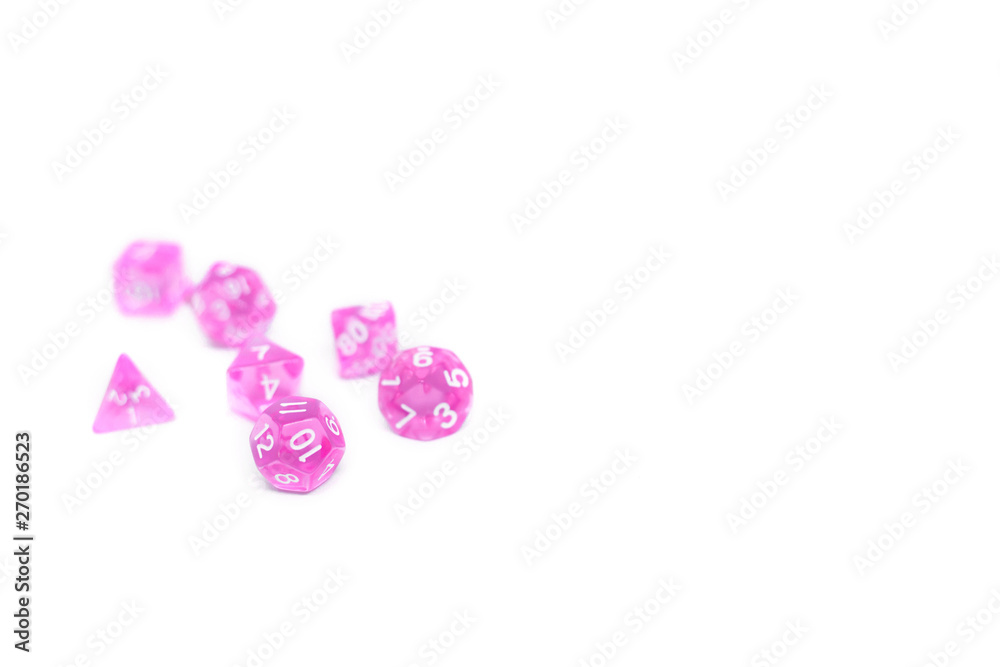 Pink dices for fantasy dnd and rpg tabletop games. Board game polyhedral dices with different sides isolated on white background Pink dices for fantasy dnd and rpg tabletop games. Board game polyhedral dices with different sides isolated on white background