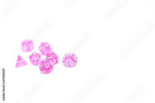 Pink dices for fantasy dnd and rpg tabletop games. Board game polyhedral dices with different sides isolated on white background