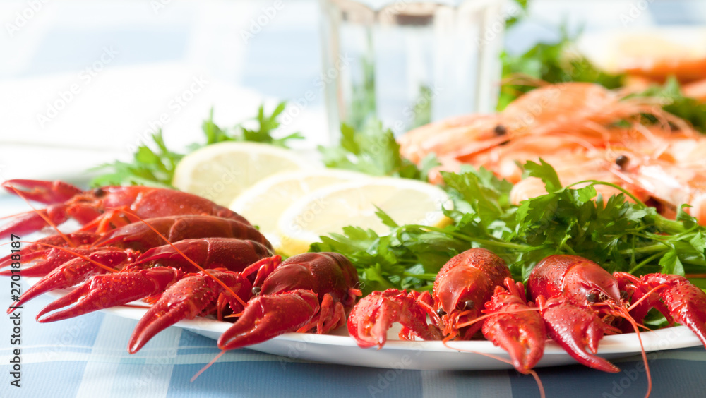 cooked shrimp and crayfish on plate close up cooked shrimp and crayfish on plate close up
