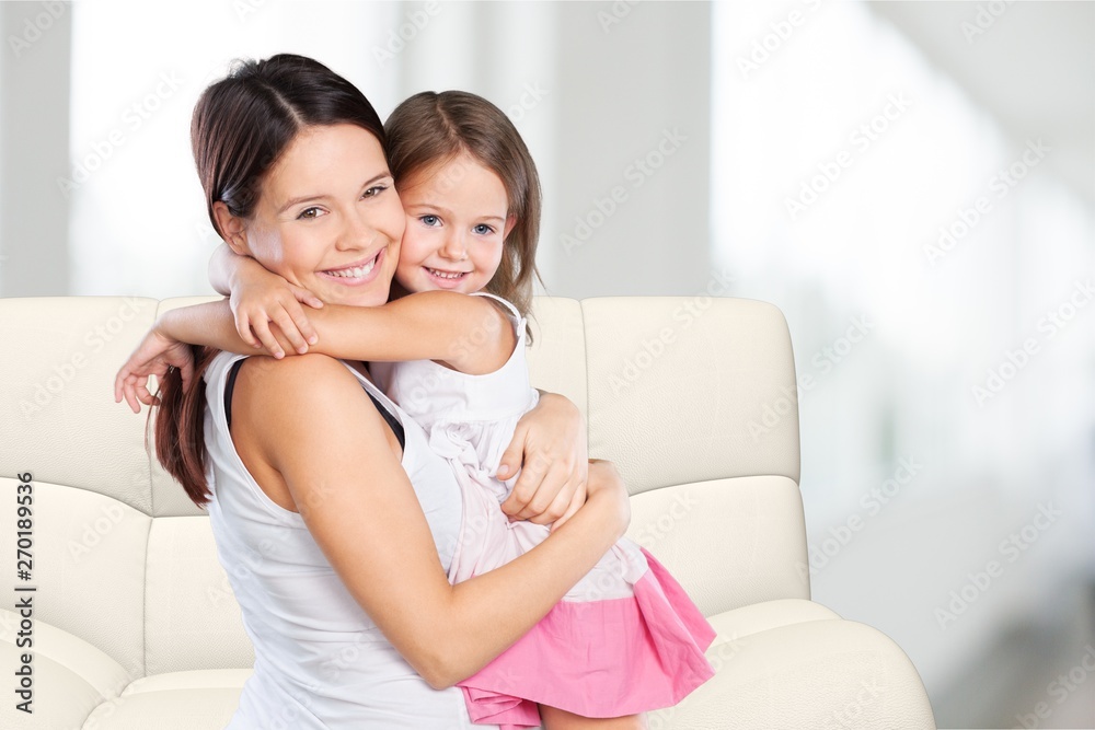 Happy Mother and daughter hugging Happy Mother and daughter hugging