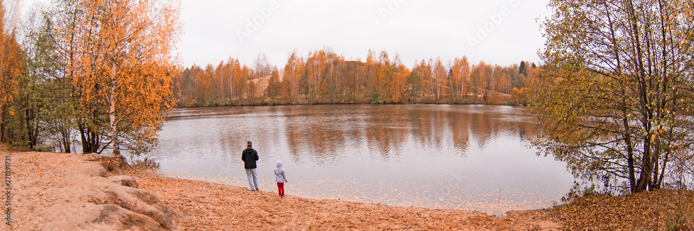 Fototapeta premium Forest River In The Fall. Picturesque sunny autumn colorful landscape.