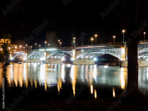 Long exposure night view of the Cathedral and Enrique Estevan bridge in Salamanca (Spain)