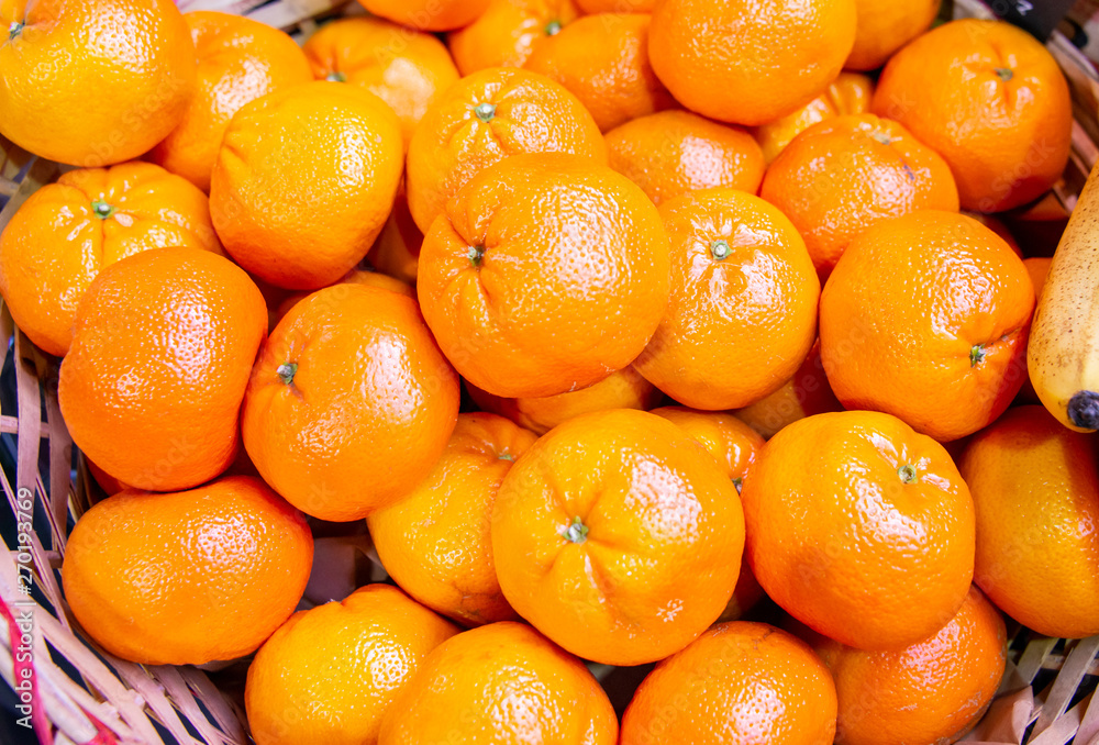 Citrus fruits at the market display stall Citrus fruits at the market display stall