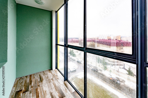 Glazed balcony of a modern residential building
