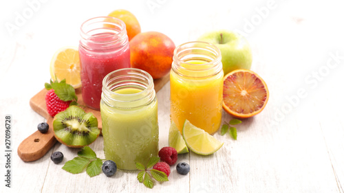 fruit juice with kiwi, berry, orange and apple