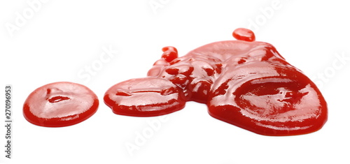 Red ketchup splashes isolated on white background, tomato pure texture